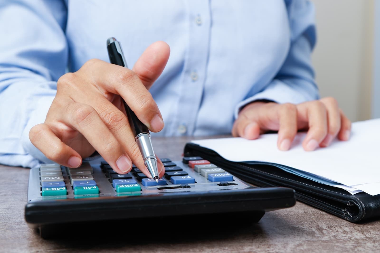 accountant-using-calculator.jpg